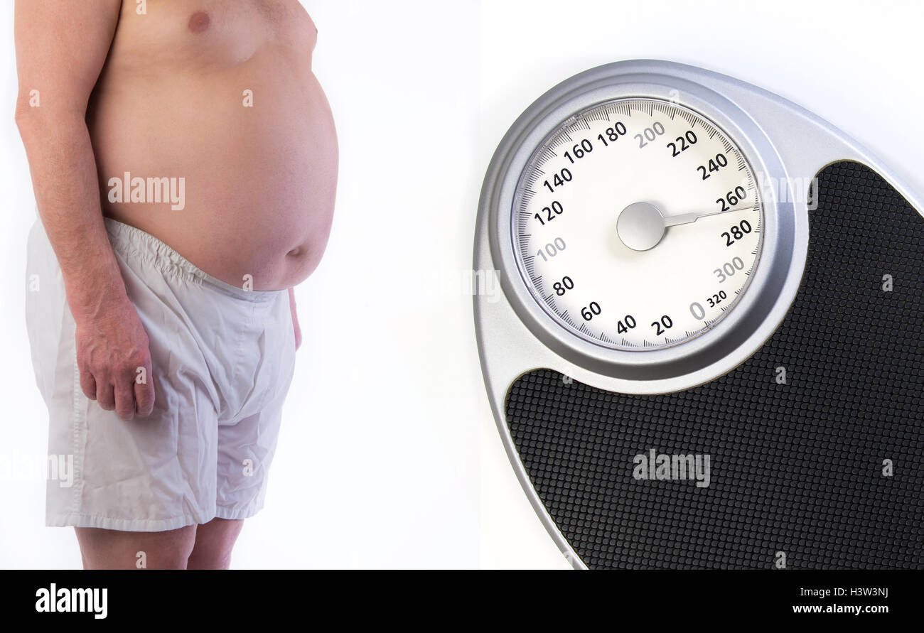 Professional weight scale and Obese male Stock Photo Alamy
