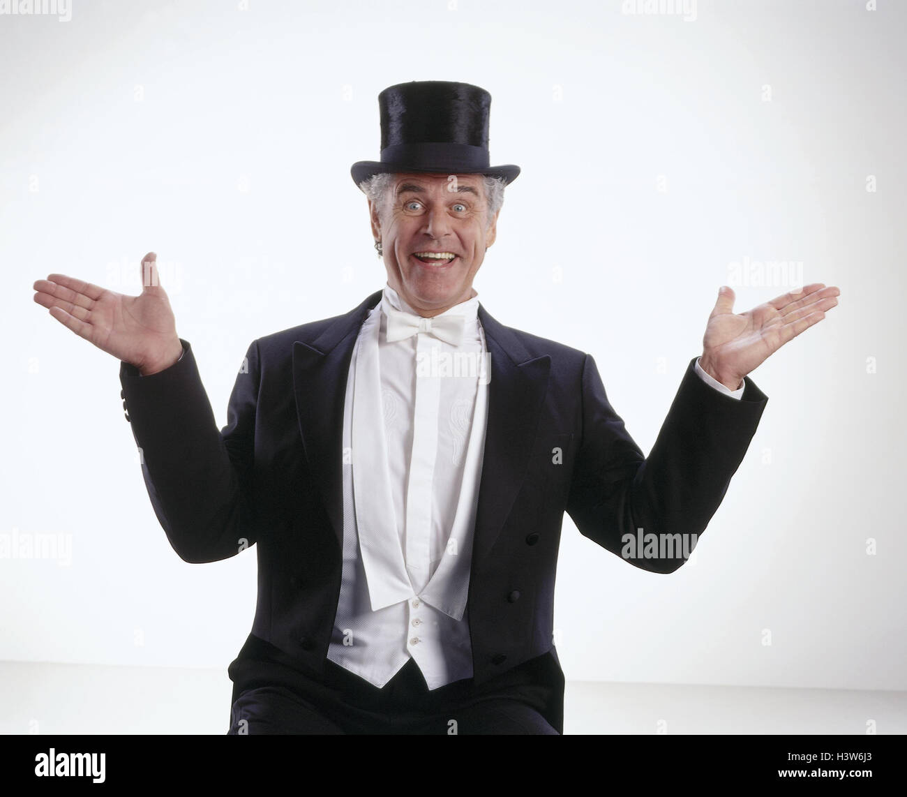 Man, tails, cylinder, gesture, joy, surprise, half portrait, studio, clothes, festively, elegantly, dinner jacket, enthusiasm, pleases, surprises, enthusiastically Stock Photo