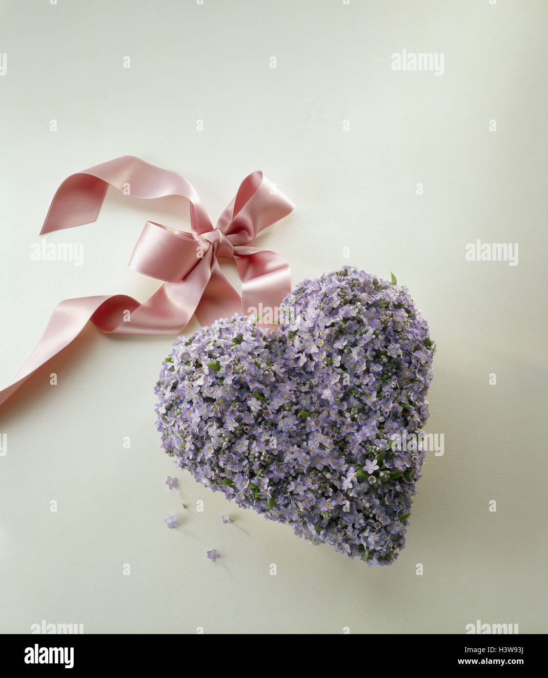 Heart, forget-me-not, blossoms, pink silk loop, cut out Stock Photo