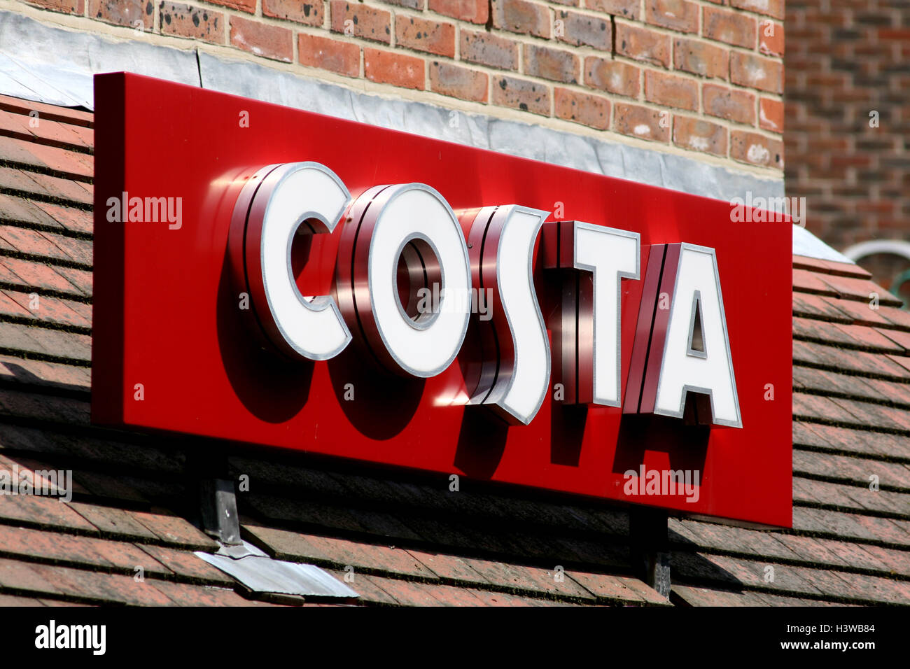 Costa store logo on tiled roof, Grove Shopping Centre, Witham, Essex, England Stock Photo