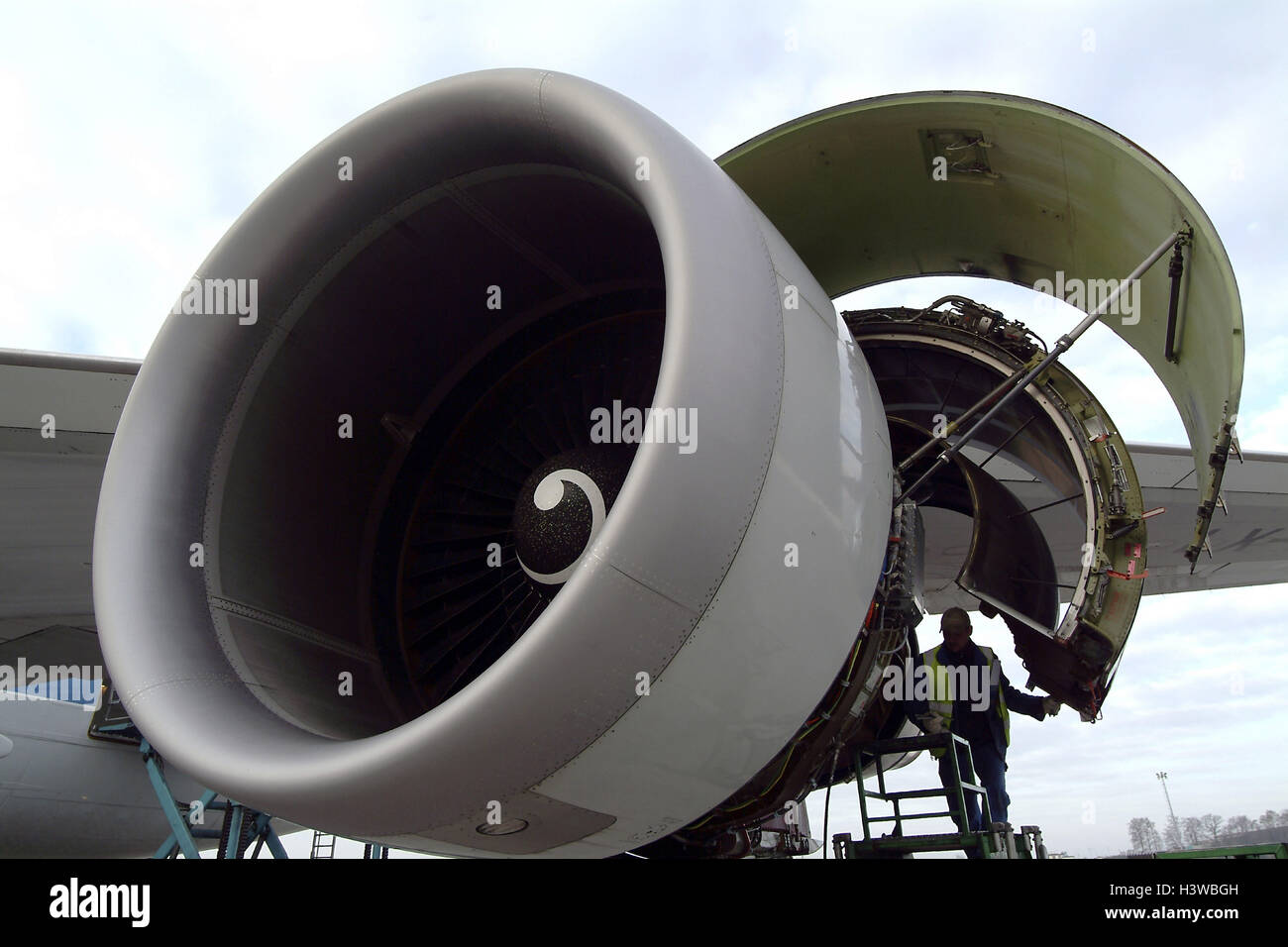 Airport grounds, airplane, detail, engine, worker, maintenance, no ...
