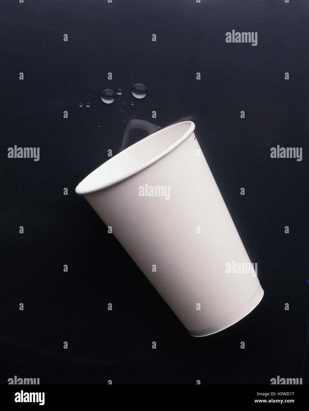 Paper cups, drops water, mugs, cardboard, nonreturnable, tipped over ...