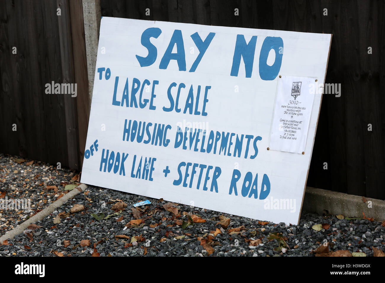 Anti-housing protest sign outside a property overlooking a main road in Pagham, West Sussex, UK. Stock Photo