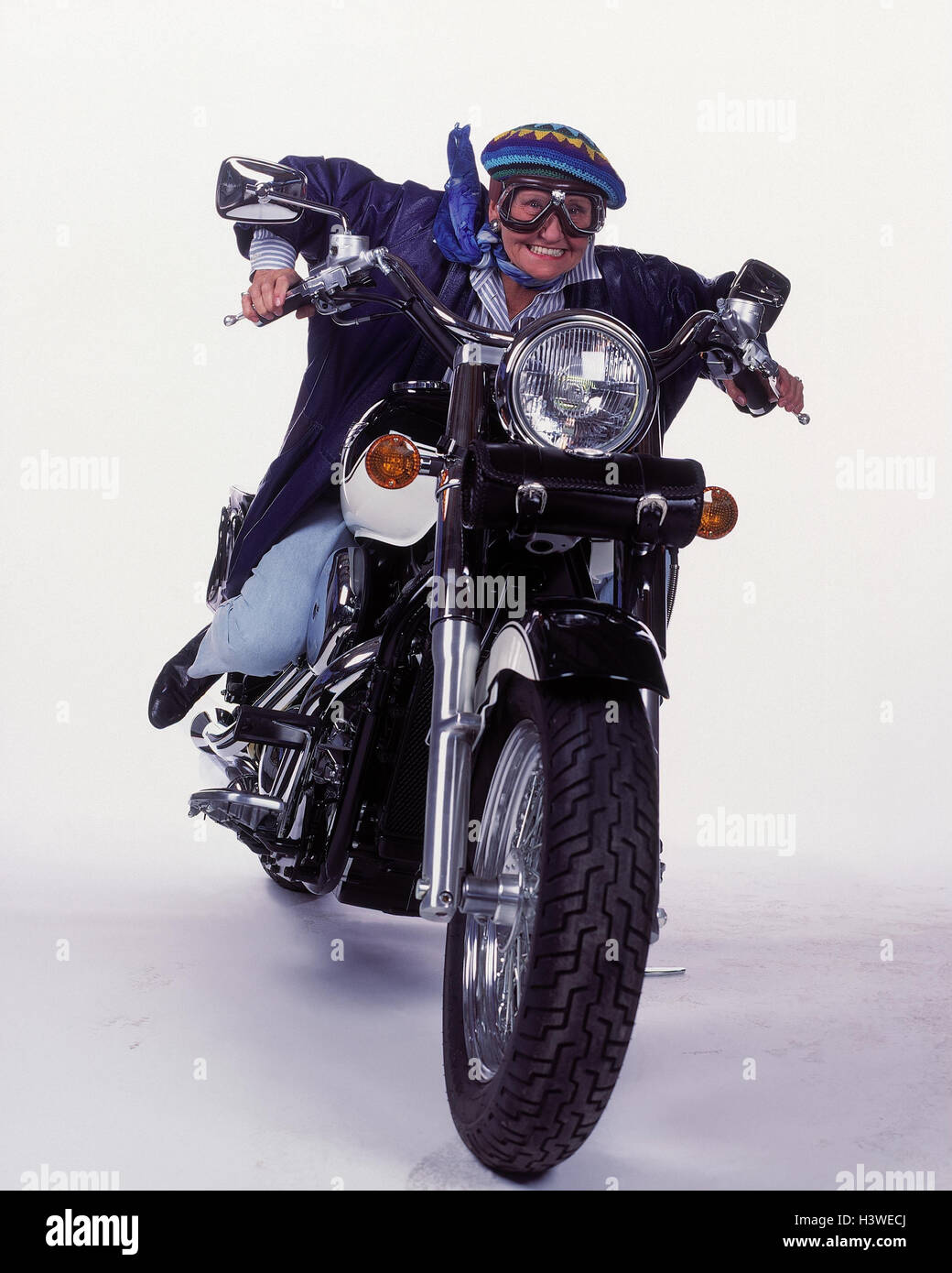 Senior, motorcycle, cord cap, leather ball bomber jacket, neckerchief, motorcycle glasses, smile pensioner, woman, old, Best Agers, fun, joy, funnily, go, joy life, fun-loving, enterprising, Jung-remaining, motorcyclist, motorcycle driving, lifestyle, wit Stock Photo
