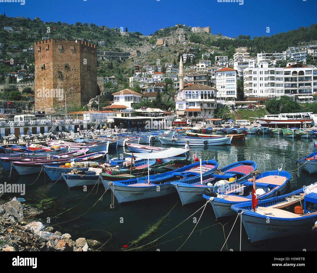 Turkey, Alanya, town view, red tower, 'Kizil Kule', harbour, boots, Europe, Southeast, Europe, town, town view, townscape, seaside resort, Turkish Riviera, stronghold, city wall, tower, 13. Cent., fastening opus, structure, culture, place of interest, fis Stock Photo