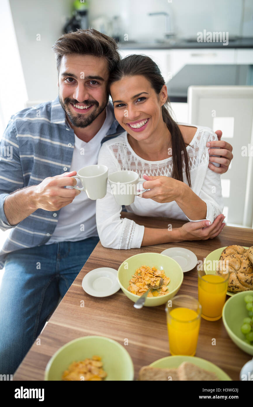 Portrait Of Couple Having Breakfast Stock Photo - Alamy