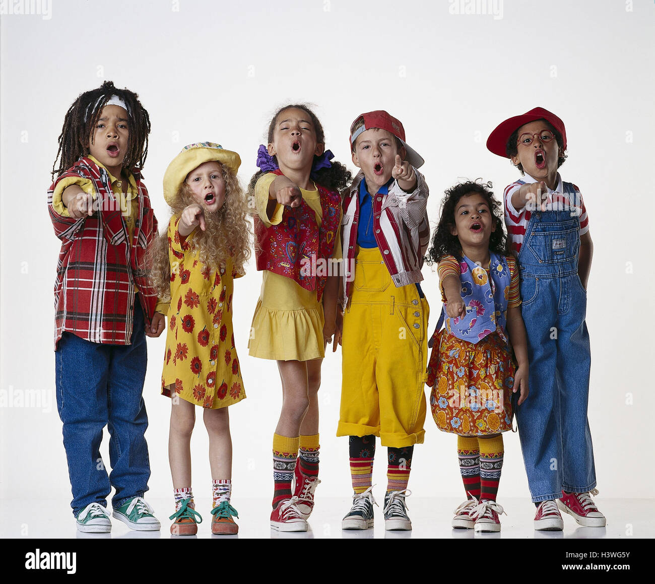 Children, nationality, various, gesture, show cut out, clothes, brightly, facial play, shout, direction, indicate, girls, boys, nations, indicate, studio Stock Photo