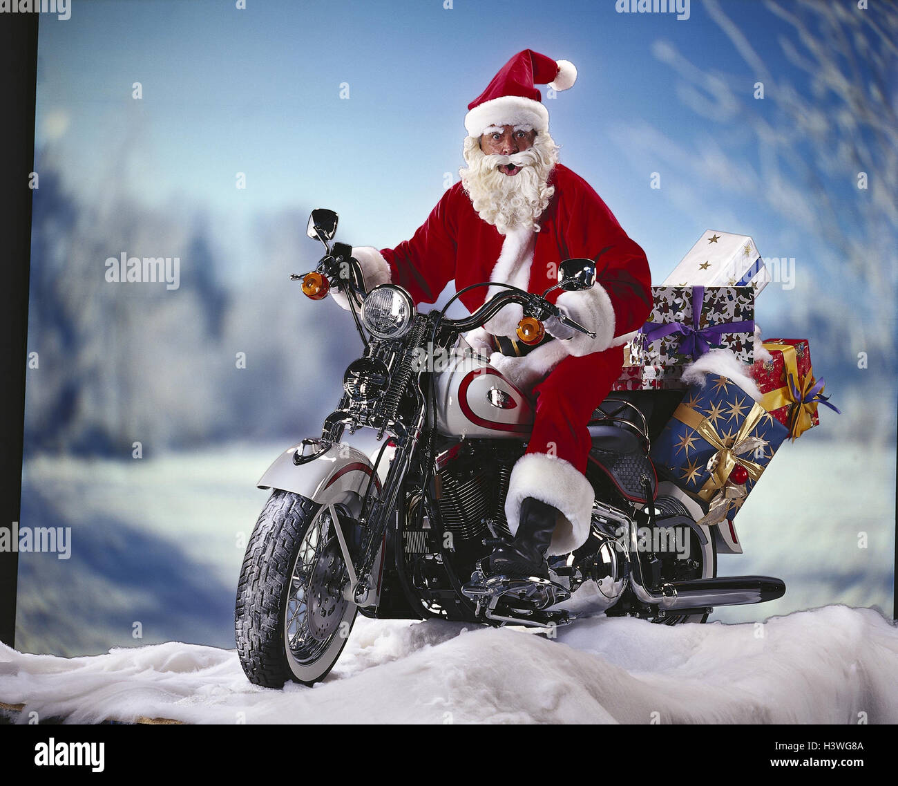 Santa Claus on motorcycle, presents mb 200 A2 Stock Photo - Alamy