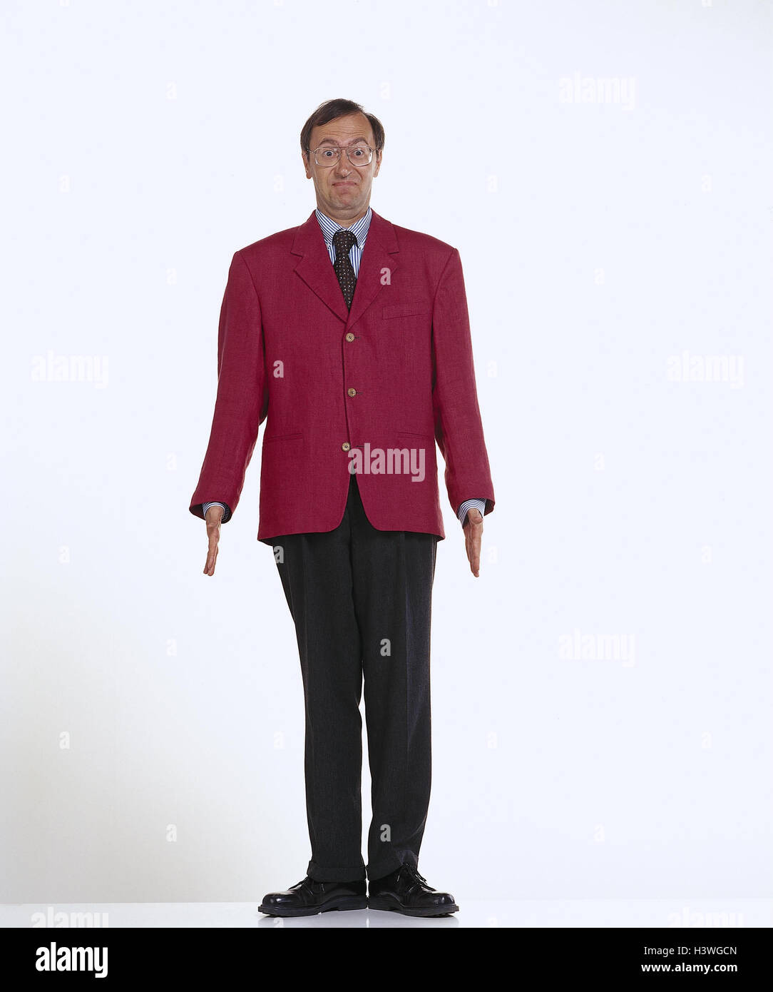 Man, red sports jacket, gesture, - 'stands tightly' studio mb 106 A5 Stock Photo