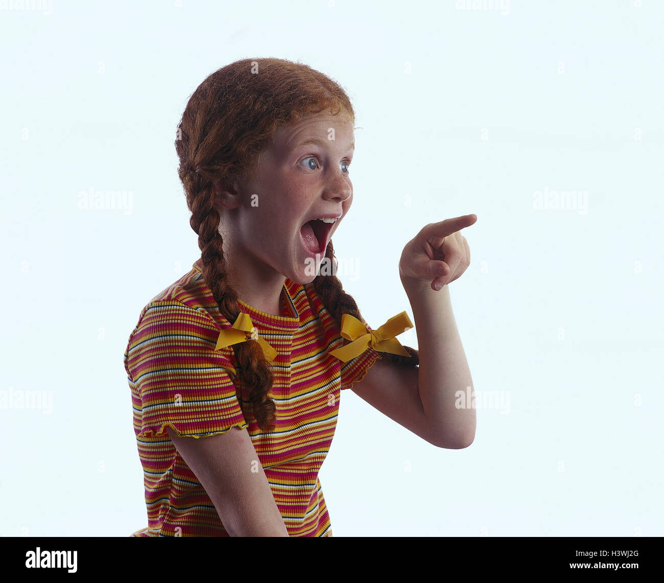 Girls, red-haired, plaits, indicate, shout, half portrait, side view, child, freckles, positive mood, enthusiasm, joy, surprise, shout, astonished, surprises, attention, joy, malicious pleasure, finish laughing, there laugh, childhood, studio, cut outs, Stock Photo