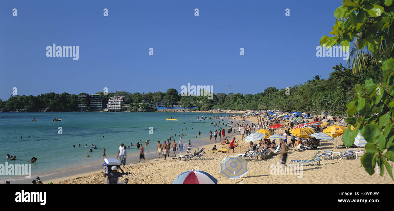 The Dominican Republic, Puerto Plata, Sosua, beach, animates, palm beach, deck chairs, bathers, beach, Atlantic, heaven, blue Stock Photo