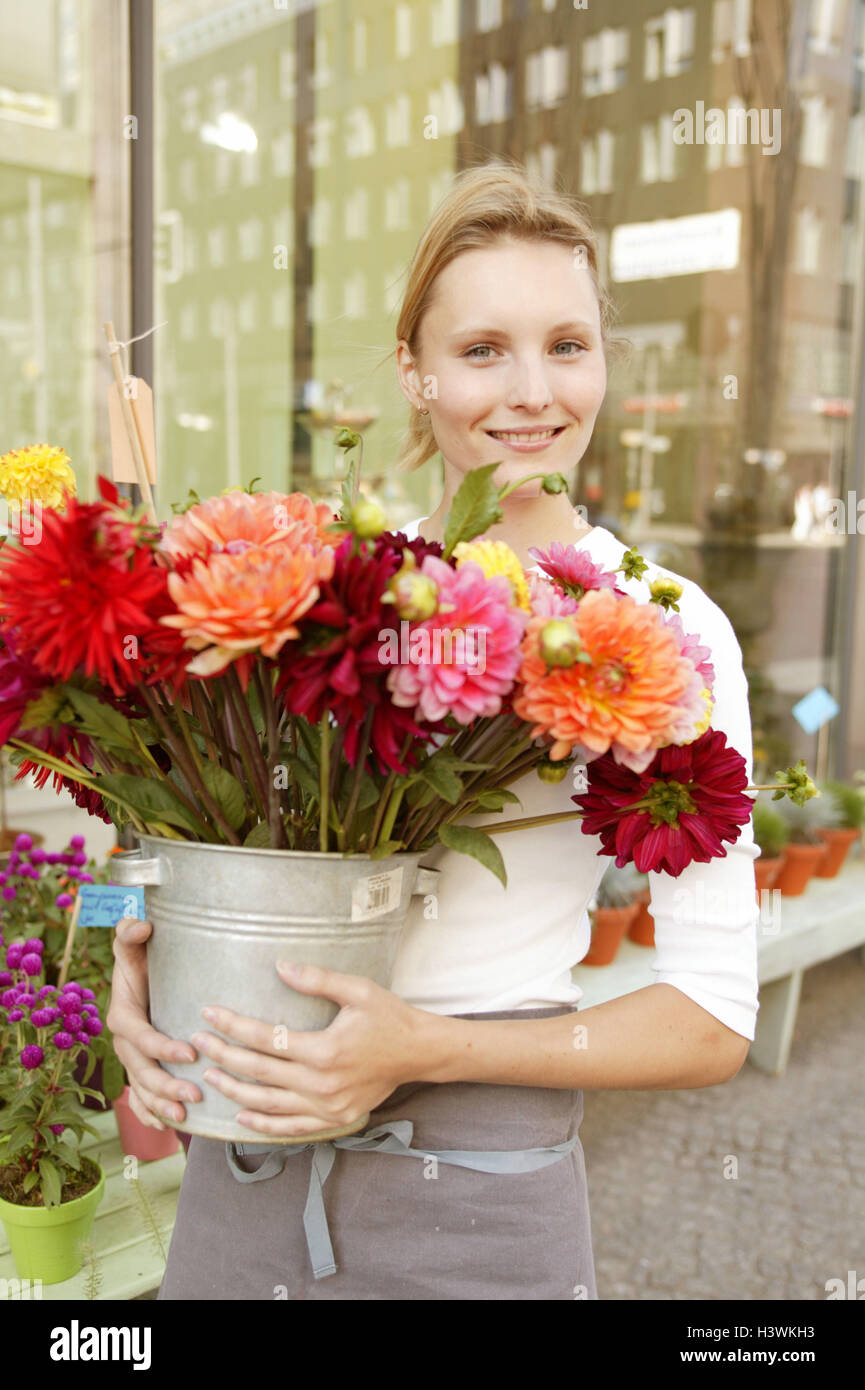 Flower business, florist, bucket, dahlias, half portrait, flower shop