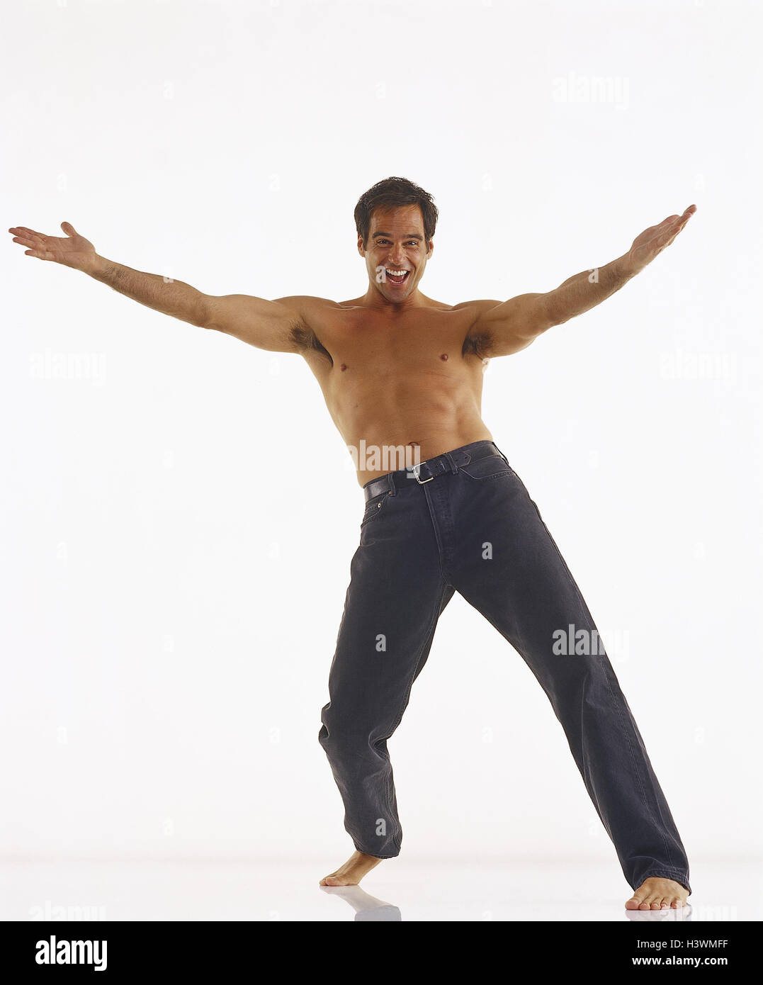 Men, barefoot, happy, funnily, melted, joy life, fun, enthusiasm, reunion, reception, warmly, studio, cut out, receive man, young, free upper part of the Body, jeans, gesture, joy, greeting, Stock Photo