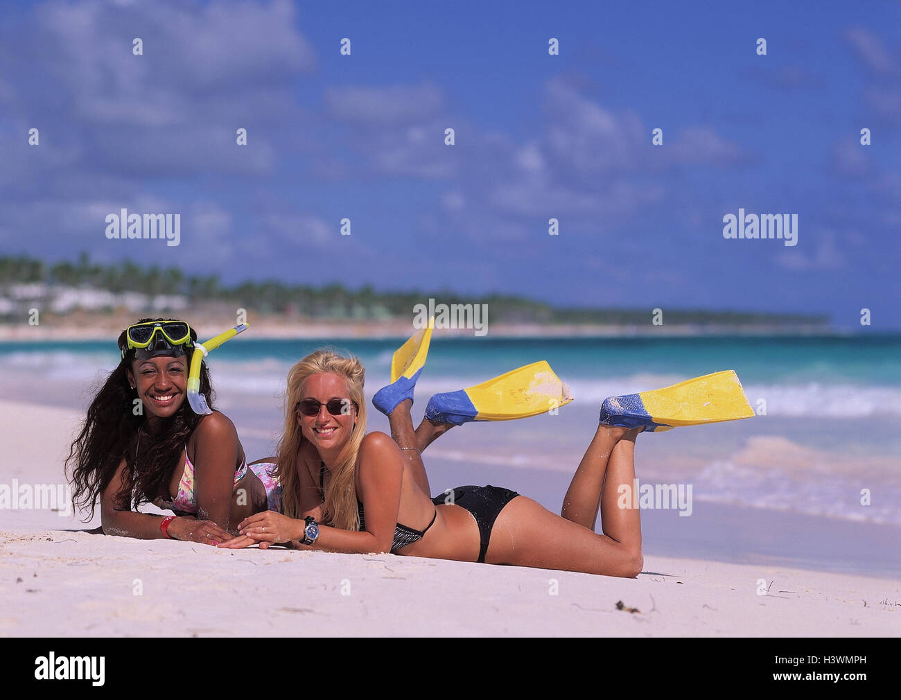 The Dominican Republic, Punta Cana, Bavaro, beach, women, two, lie, snorkel equipment, happy, races, non-whites, Mulattin, friends, woman Stock Photo