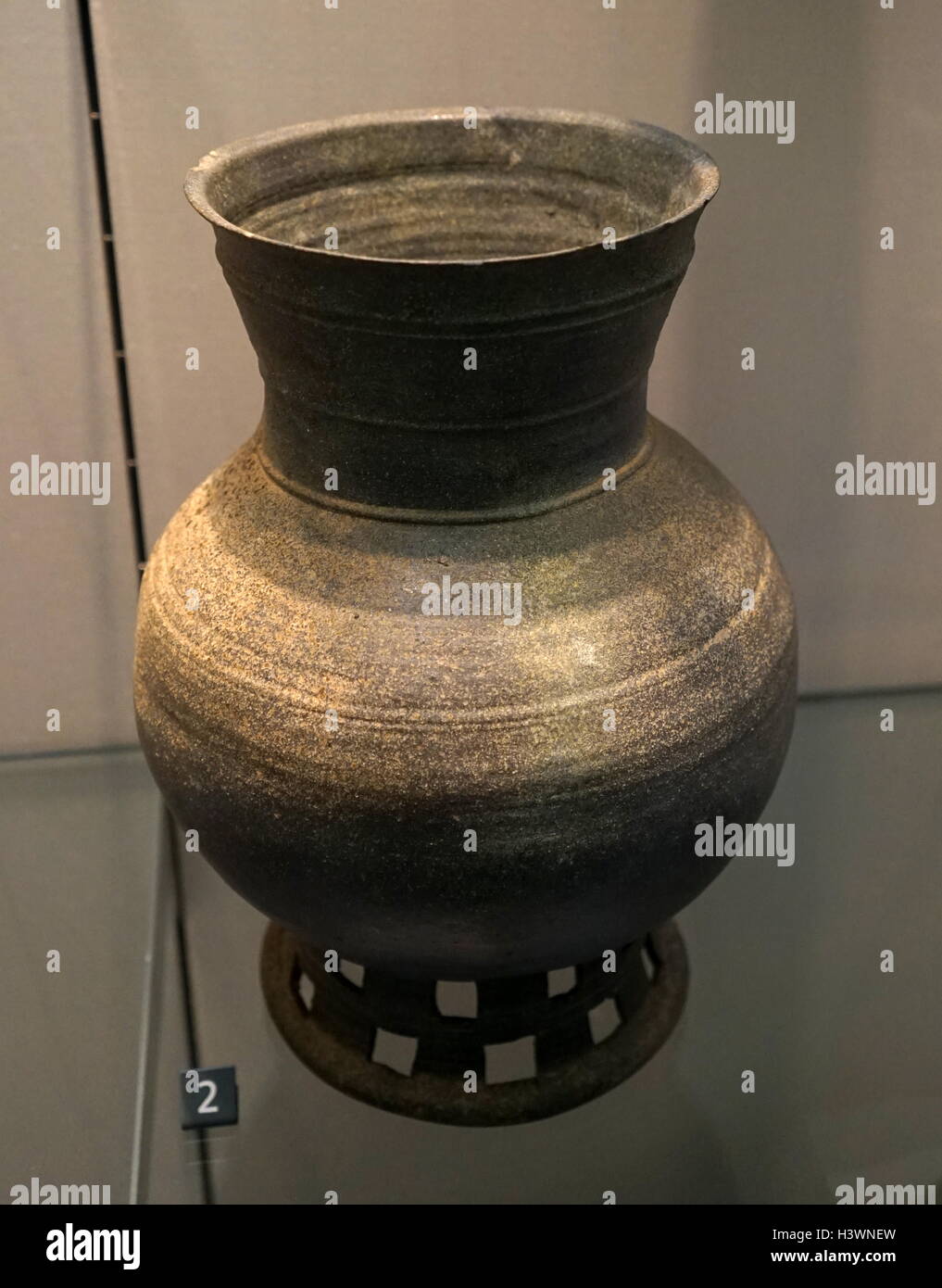 Stoneware jar on a perforated pedestal. Dated 5th Century Stock Photo