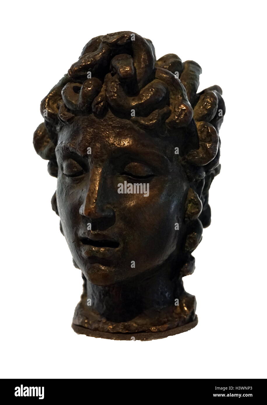 Bronze head of Medusa by Benvenuto Cellini (1500-1671) an Italian goldsmith, sculptor, draftsman, soldier, musician, and artist. Dated 16th Century Stock Photo