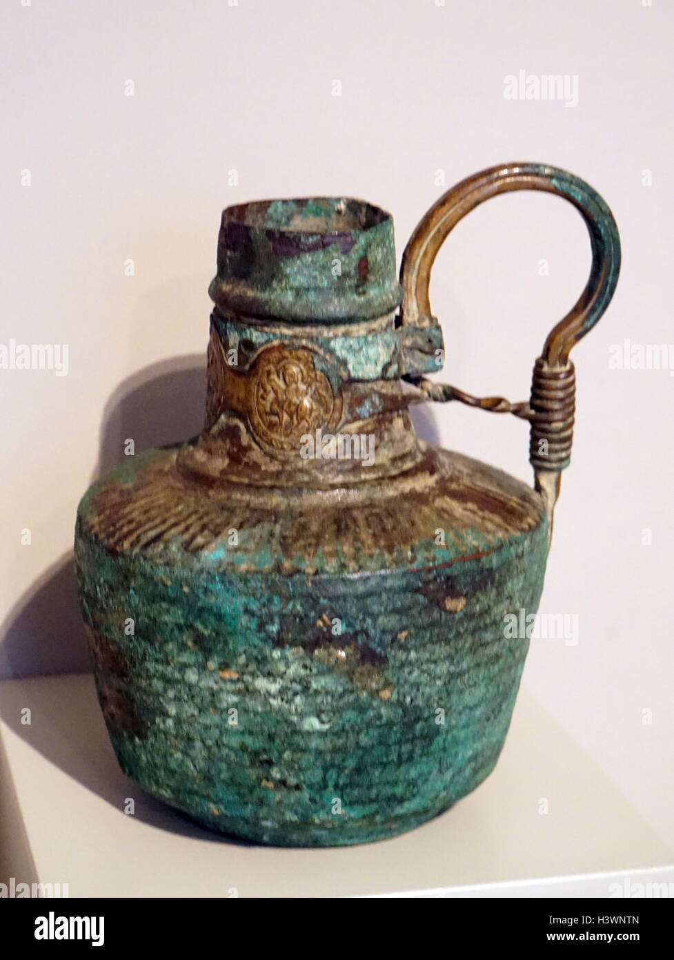 Copper and brass ewer with roundels, depicting warrior saints. From the Byzantine Empire. Dated 7th Century Stock Photo