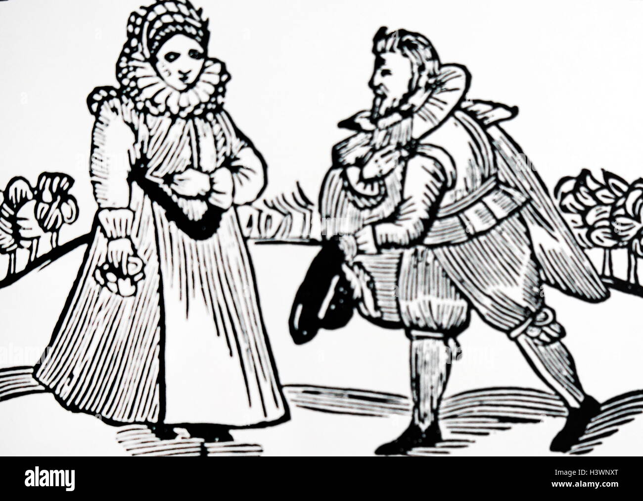 Woodblock print titled 'The Ardent Wooer' depicting a couple courting during the Elizabethan era. Dated 16th Century Stock Photo