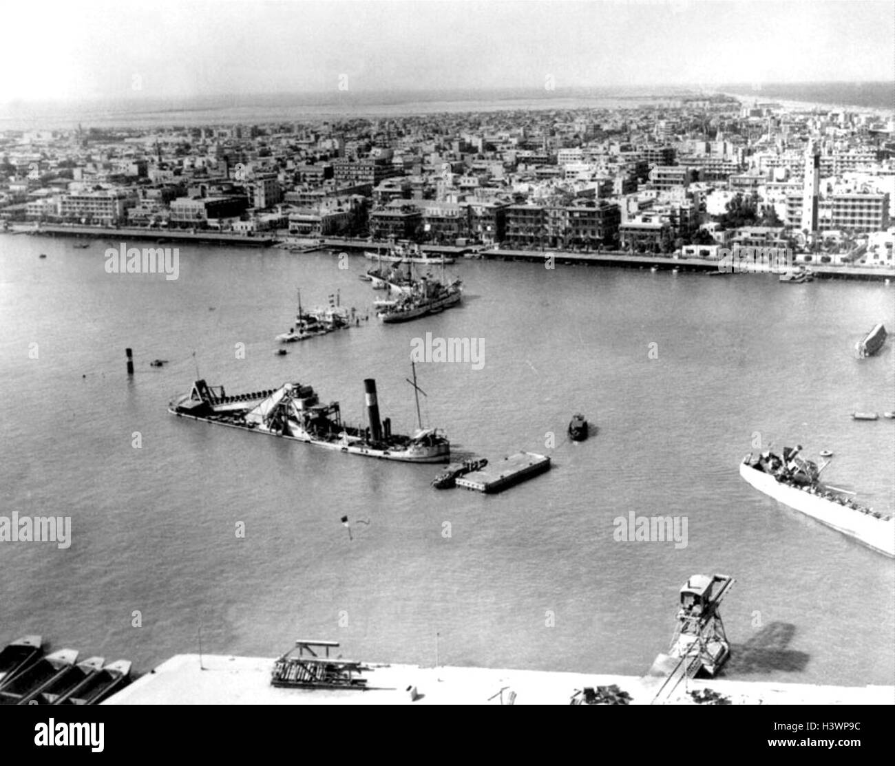 Photograph of Scuttled ships blocking the entrance to the Suez canal at Port Said during the Six-Day War between Israel and Egypt. Dated 20th Century Stock Photo