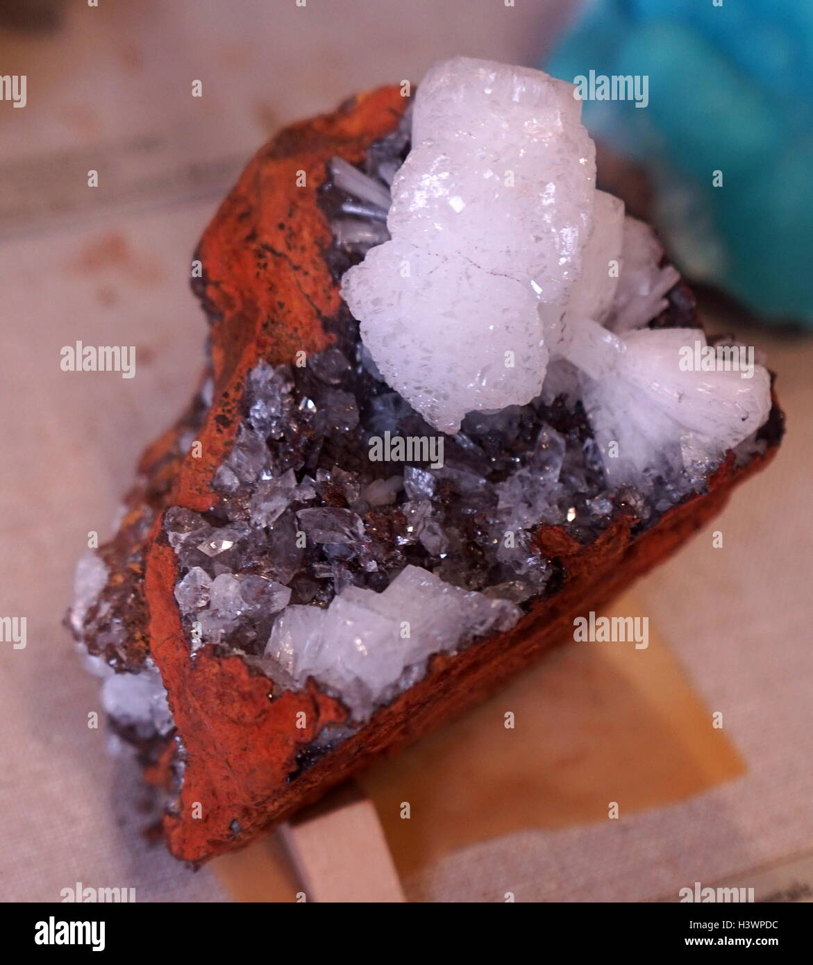 A sample of white and colourless crystals on Limonite, an iron ore consisting of a mixture of hydrated iron(III) oxide-hydroxide. Dated 21st Century Stock Photo
