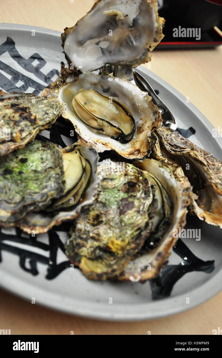 Burning Oyster Japan Stock Photo Alamy
