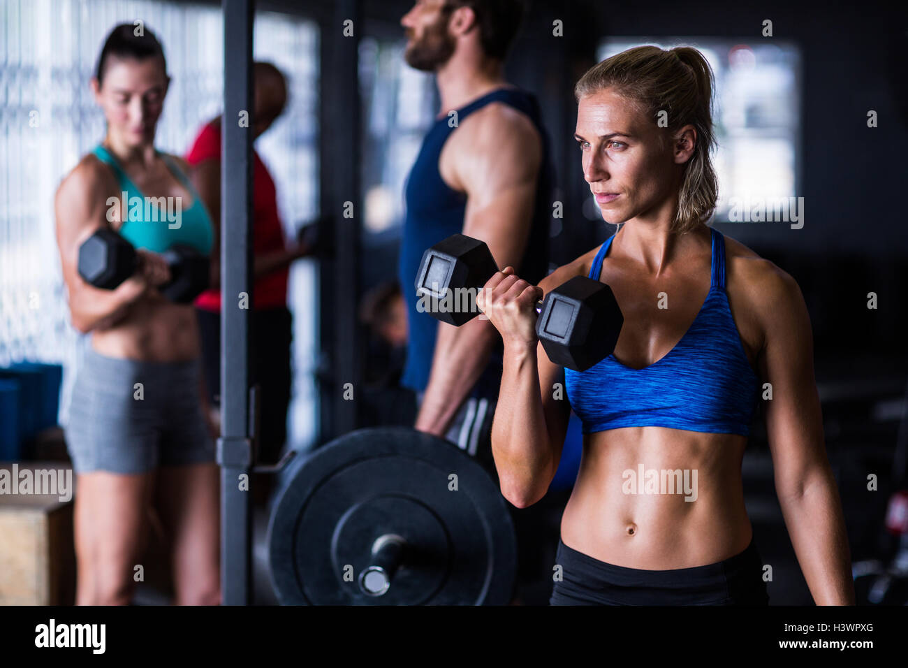 Confident woman standing gym hi-res stock photography and images - Alamy
