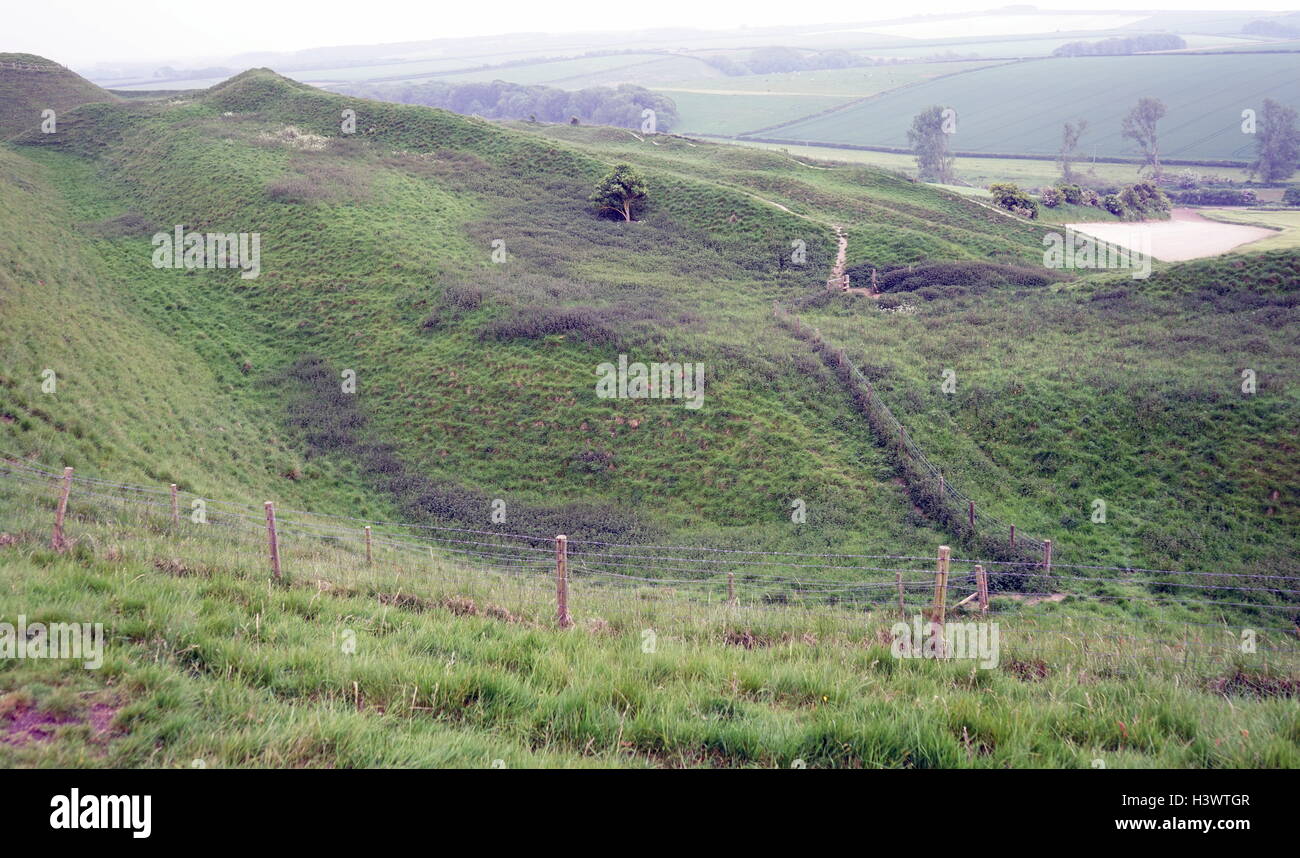 View of Maiden Castle, an Iron Age hill fort, a type of earthworks used as a fortified refuge which would exploit elevations. Dated 21st Century Stock Photo