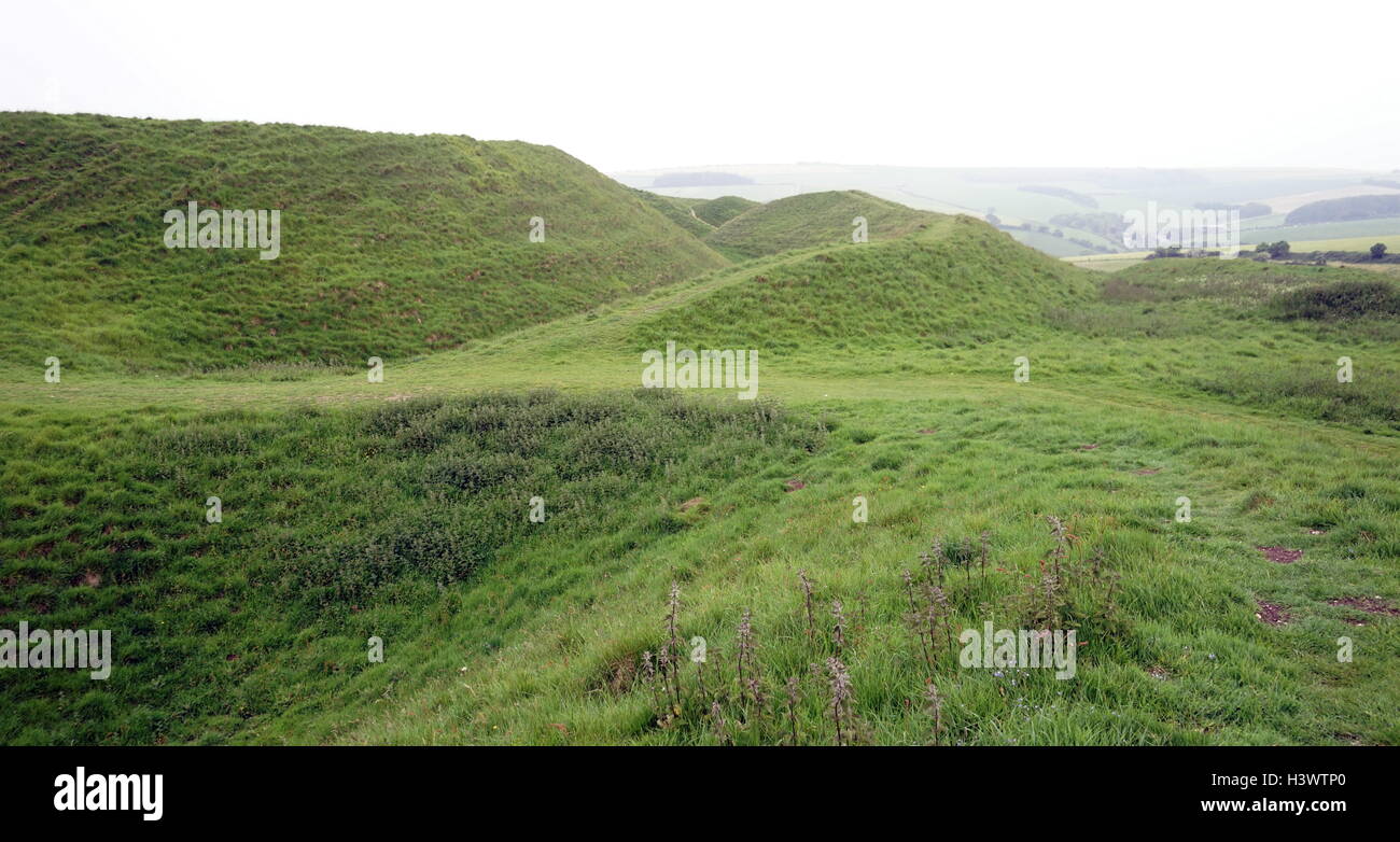 View of Maiden Castle, an Iron Age hill fort, a type of earthworks used as a fortified refuge which would exploit elevations. Dated 21st Century Stock Photo