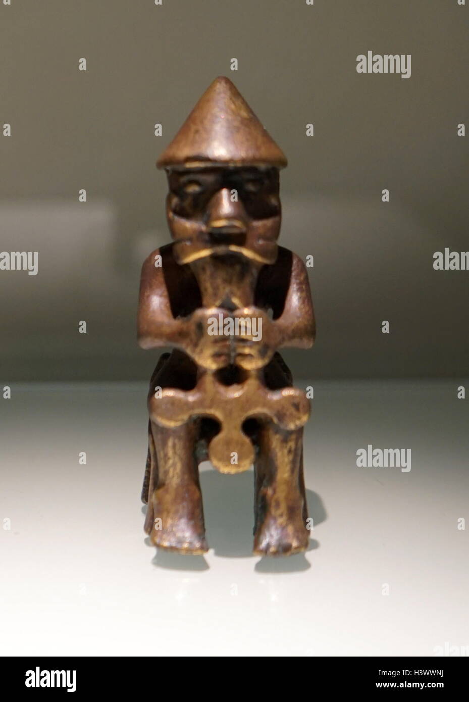 Wooden figure of the Norse God Thor, associated with thunder, lightning, storms, oak trees, strength, and the protection of mankind. Dated 9th Century Stock Photo