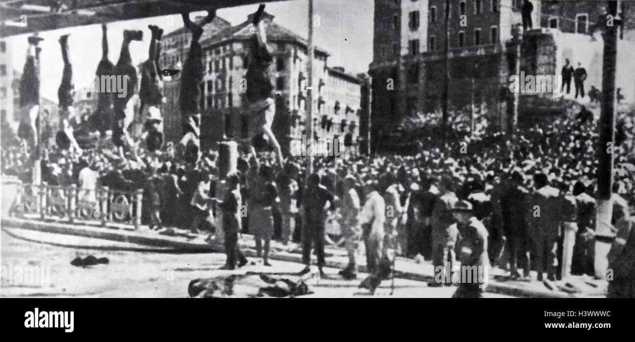 Photograph of the hanging bodies of Mussolini and Petacci in the Piazzale Loreto, Milan. Dated 20th Century Stock Photo