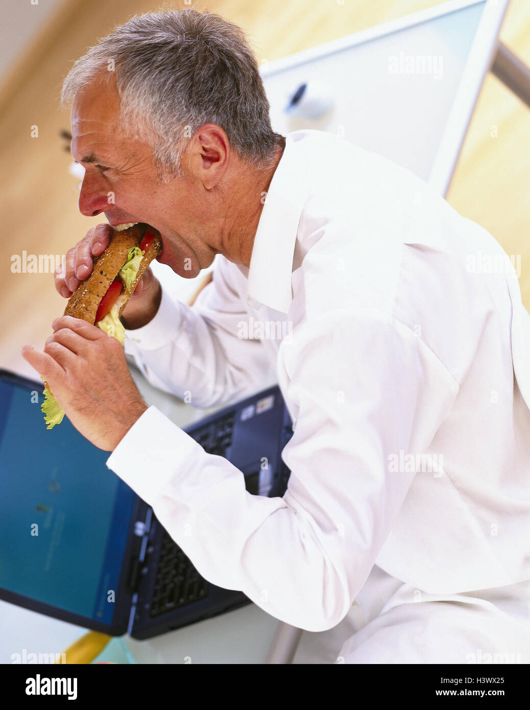 Man sandwich office desk hi-res stock photography and images - Alamy