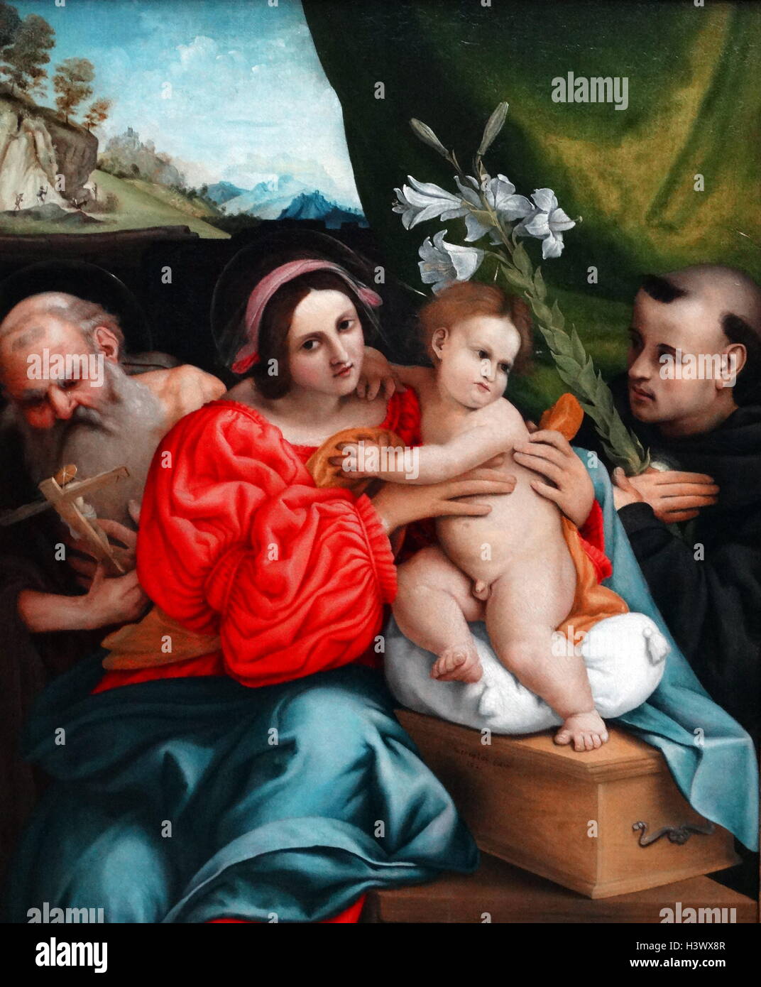 The Virgin and Child with Saints Jerome and Nicholas of Tolentino by Lorenzo Lotto (1480-1556) an Italian painter, draughtsman and illustrator. Dated 16th Century Stock Photo