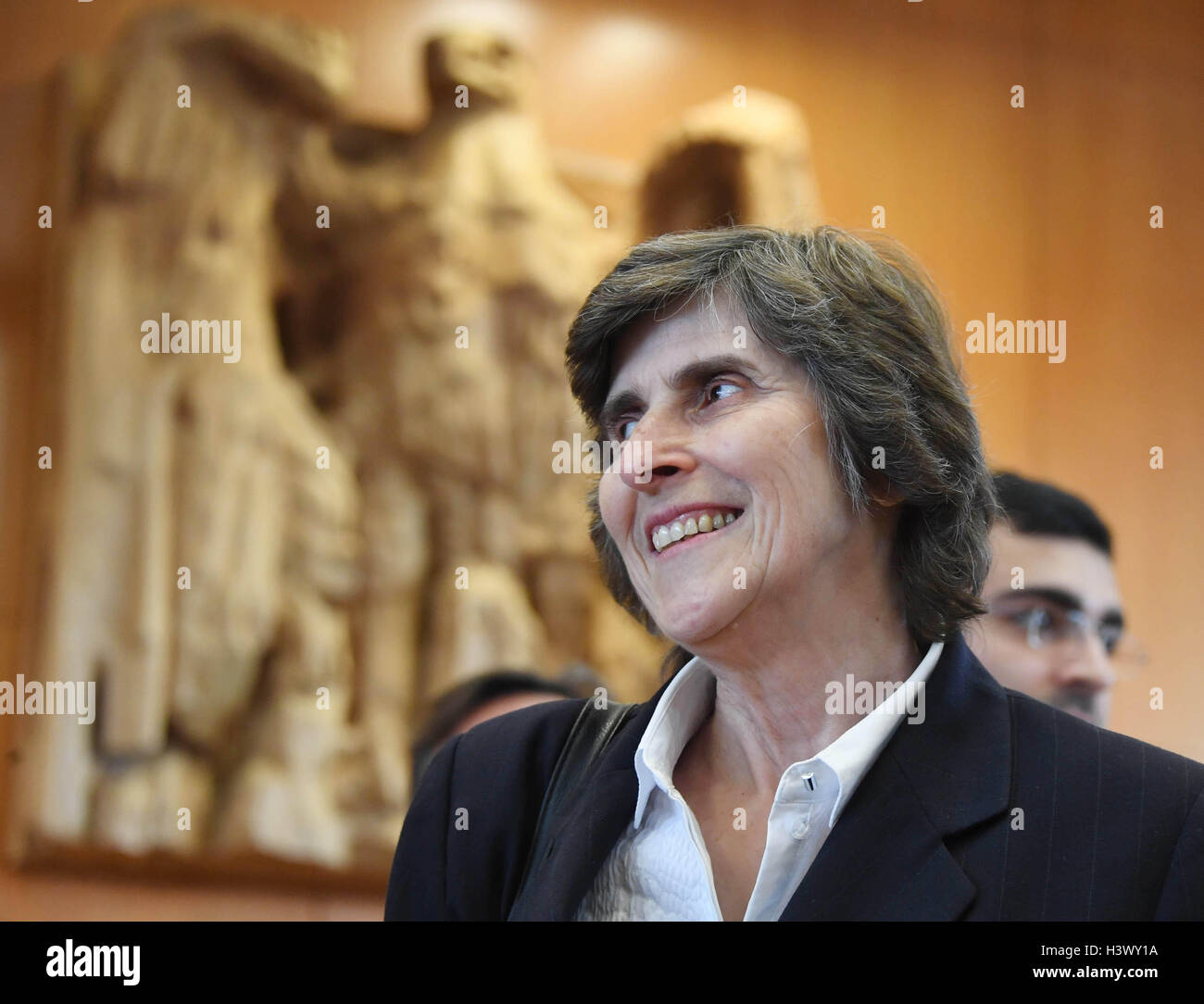 Karlsruhe, Germany. 12th Oct, 2016. Complainant Marianne Grimmenstein-Balas waits for the start of the trials regarding the emergency appeal against the trade agreement CETA in Karlsruhe, Germany, 12 October 2016. Photo: Uli Deck/dpa/Alamy Live News Stock Photo