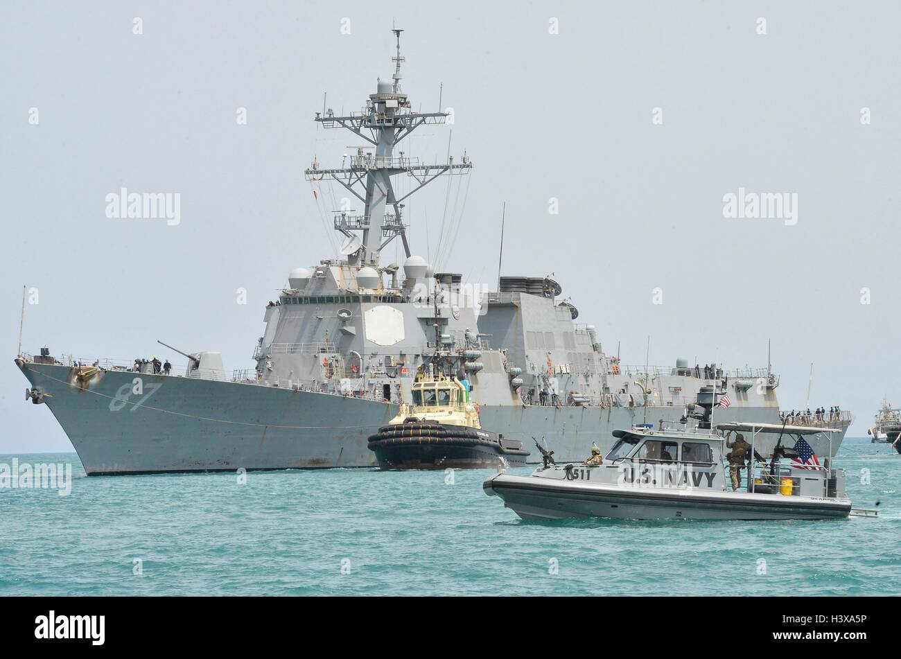 At Sea. 23rd July, 2016. The US Navy Arleigh Burke-class guided-missile destroyer USS Mason pulls into port escorted by Coastal Riverine Squadron 8 sea ark patrol boats July 23, 2016 in the Port of Djibouti. The USS Mason was fired upon by Houthi rebels while sailing off the coast of Yemen in the southern end of the Red Sea on October 12, 2016 and the USS Nitze returned missile fire destroying ground stations in Yemen. Credit:  Planetpix/Alamy Live News Stock Photo