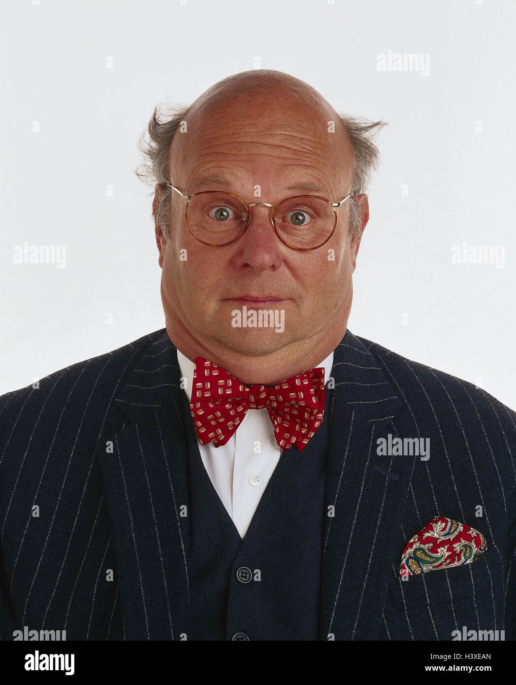 Senior, suit, fly, glasses, half bald head, facial play, portrait