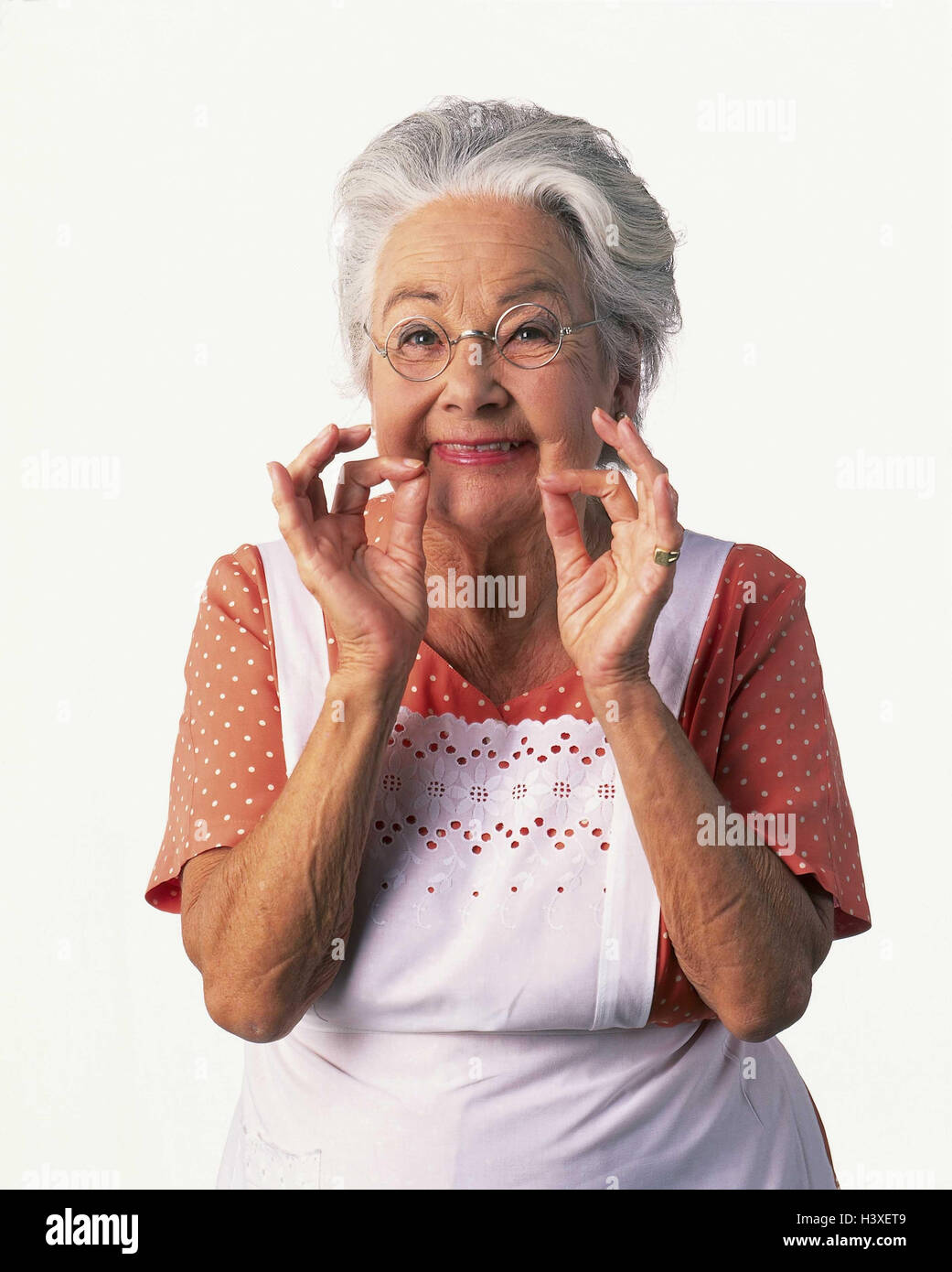 Senior, apron, gesture, finger, well, delicately, exquisitely, joy, half portrait, Senior, inside, cut out, woman, old, hairs, grey, glasses, granny, housewife, smile, select, excellently, happy, studio, Stock Photo