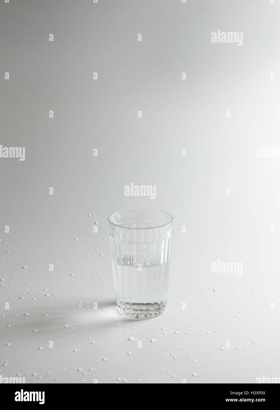 glass of water on light background Stock Photo