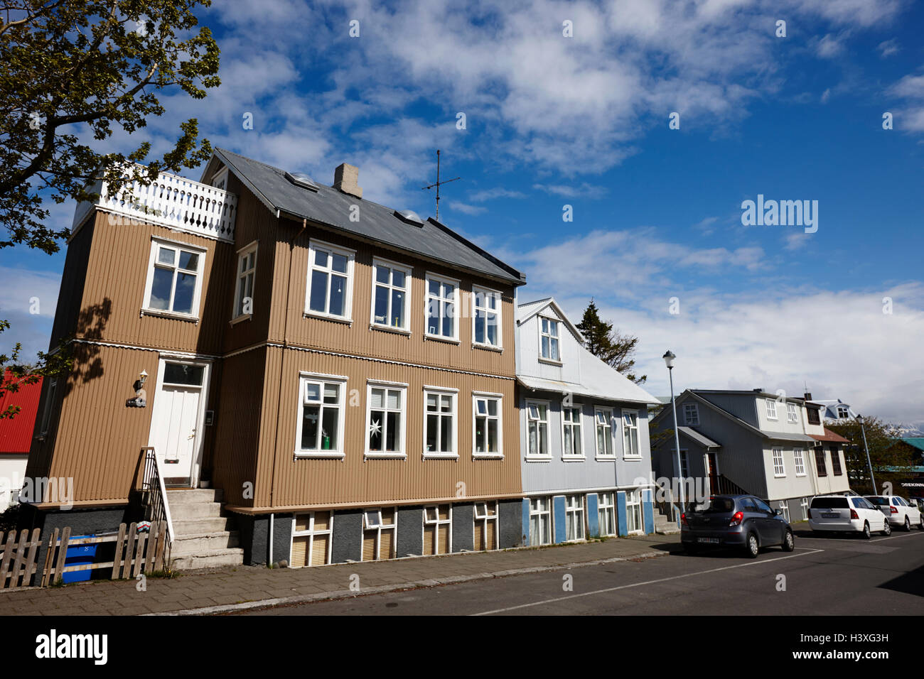 painted corrugated iron tin clad houses in a residential reykjavik Iceland Stock Photo