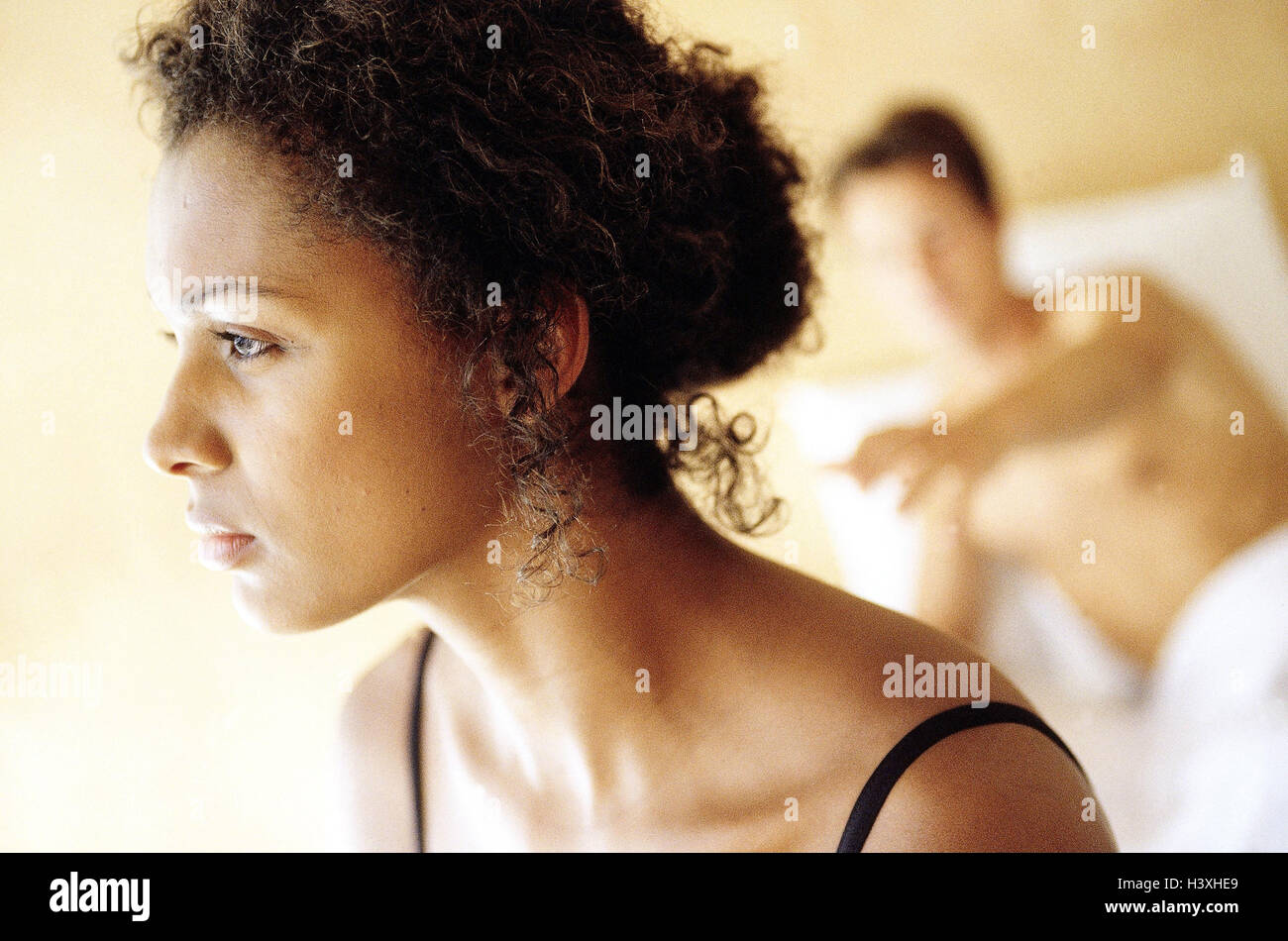 Bed, couple, disappointment, detail, blur, model released, very close, woman, tread, skin colour, nationality, differently, dark-skinned, partner, partnership, marriage problems, problems, conflict, discontent, thoughtful, unhappily, dissatisfied, disappo Stock Photo