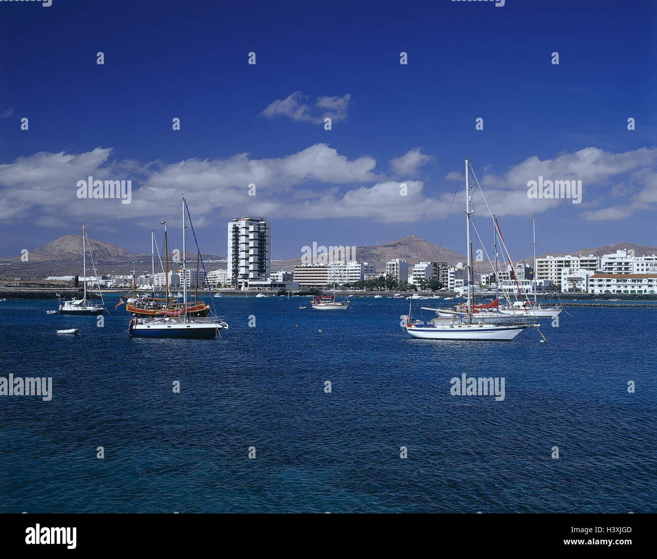 Spain, Lanzarote, Arrecife, Charo de, San Gines, harbour, ships, outside, Canary islands, island, the Atlantic, Atlantic, sea, town, island capital, nature harbour, sailing ships, sailboats, houses, high rises Stock Photo