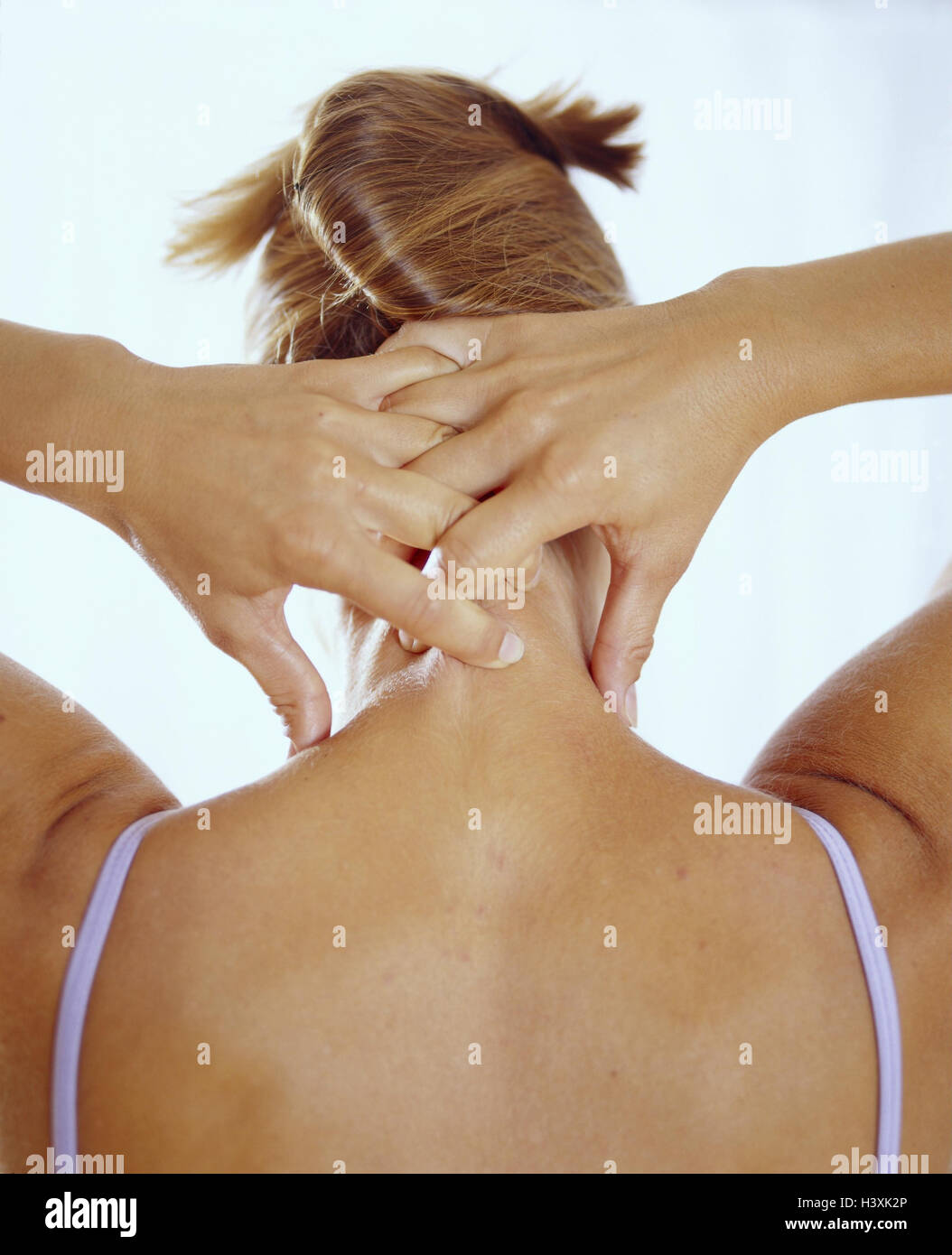 Woman, young, acupressure, nape, shoulders, back view autoacupressure, cure, medicine, alternatively, TCM, traditional Chinese medicine, therapy, grip, printing, printing treatment, selftreatment Stock Photo