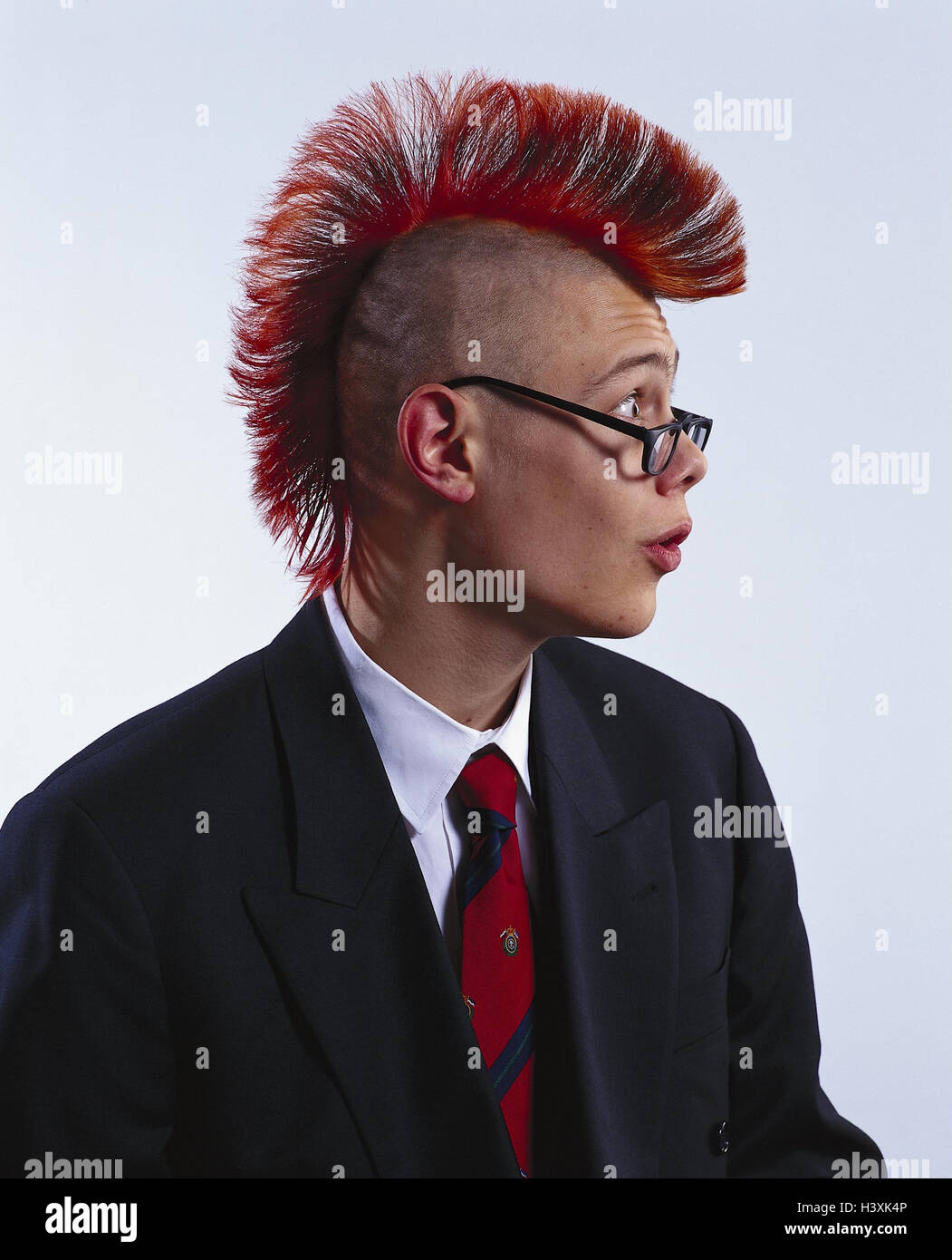 Man, young, suit, tie, punk hairstyle, glasses, facial play punk, punk,  young person, hairs, red, Irokesen editing, portrait, side view, tread,  studio, cut out Stock Photo - Alamy