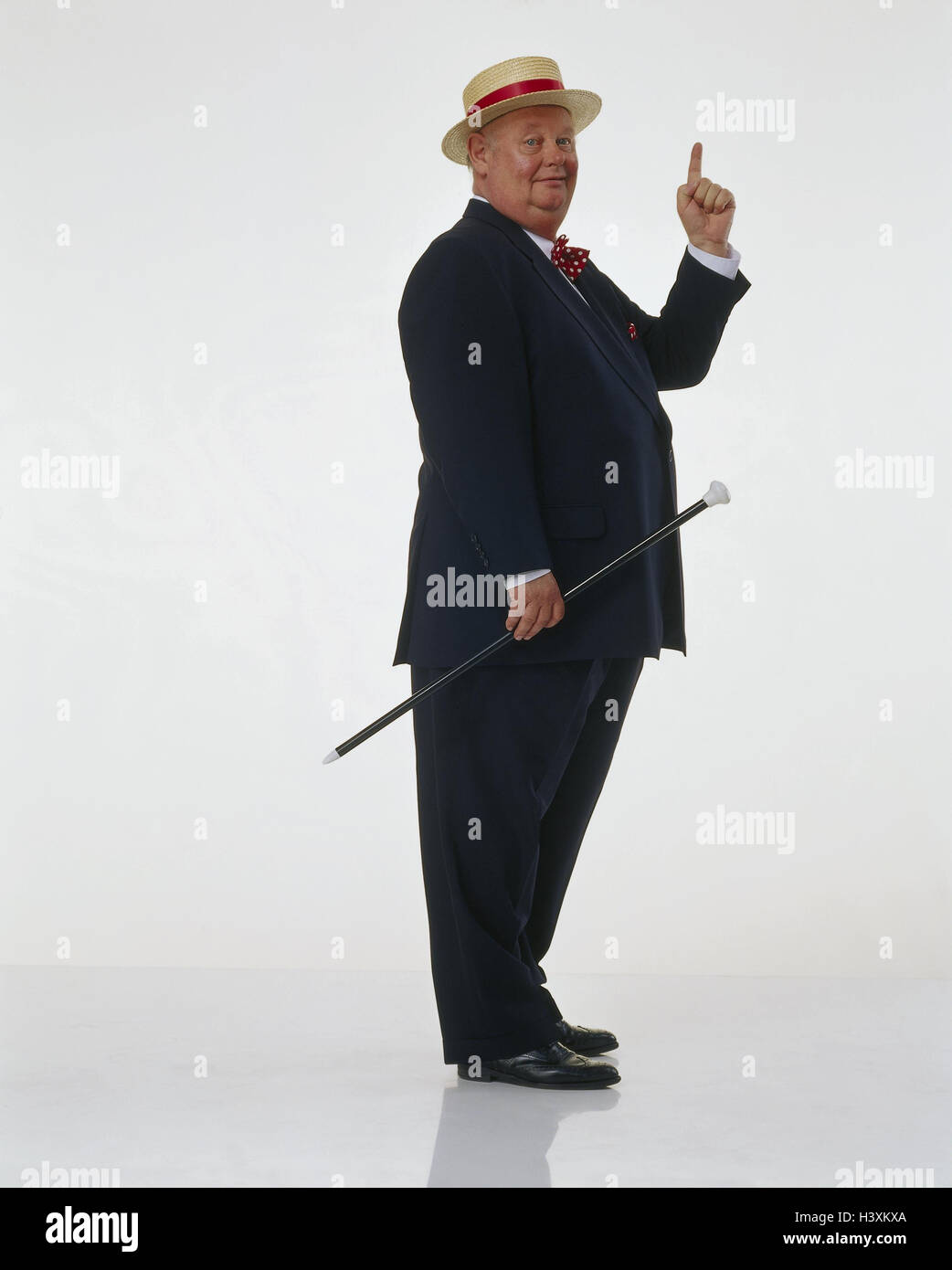 Senior, stand thickly, suit, straw hat, floor, forefingers, upraisedly, side view, Heavy Weights, cut out, studio, man, old, clothes, elegantly, stout, overweight, fat, walking floor, walking help, movement the hand, body language, point, indicate, send o Stock Photo