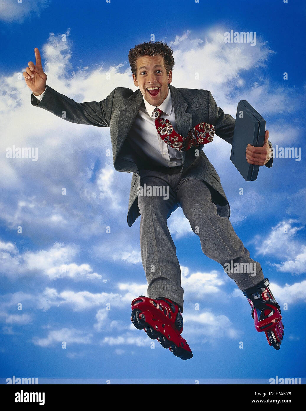 Composing, manager, Inline skat, laptop, caper, cloudy sky studio, man, young, businessman, dynamically, ecstatically, sportily, joy life, motion, enthusiastically, enthusiasm, happy, Stock Photo