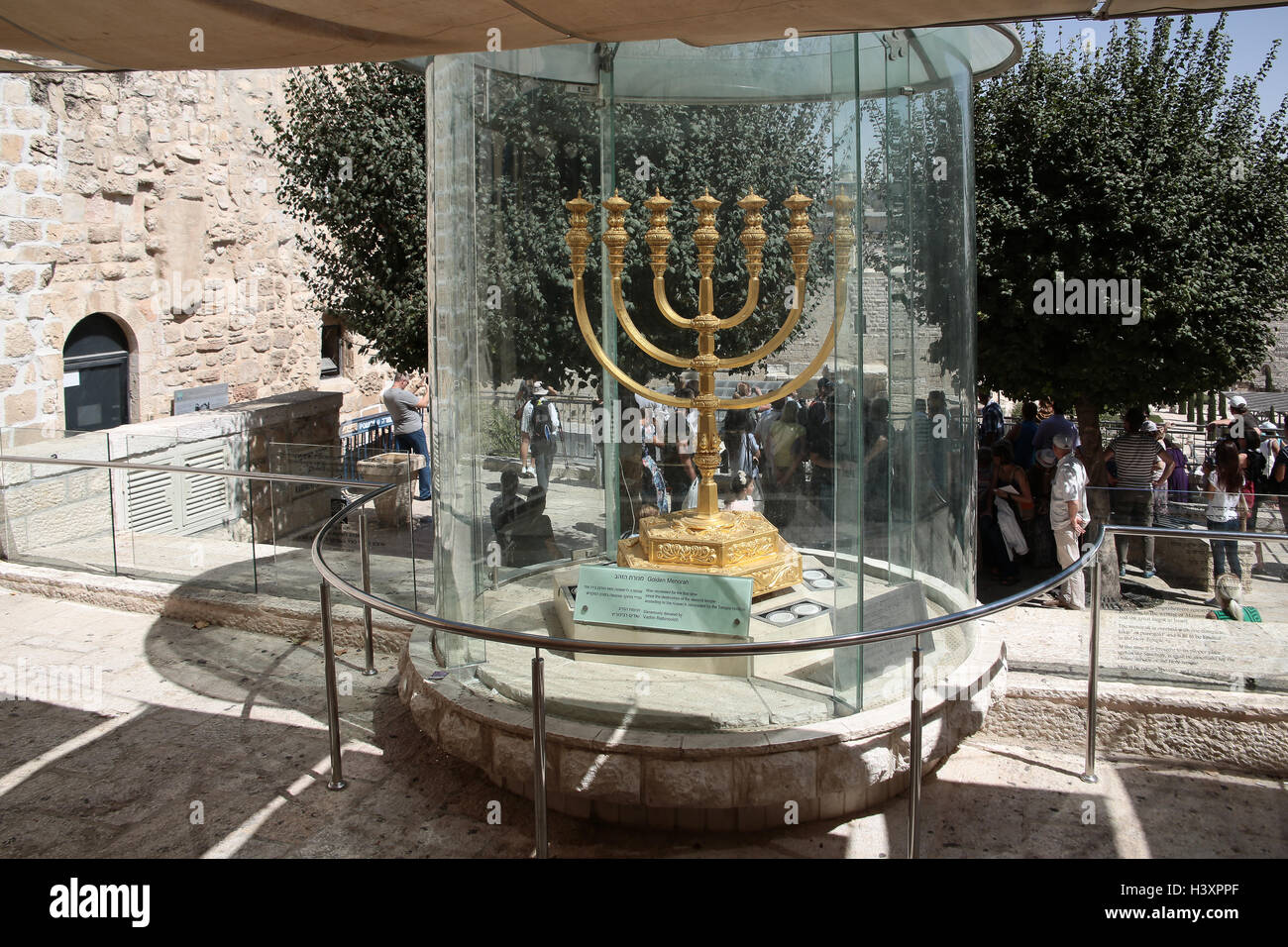 A golden menorah in the old city of Jerusalem. From a series of photos