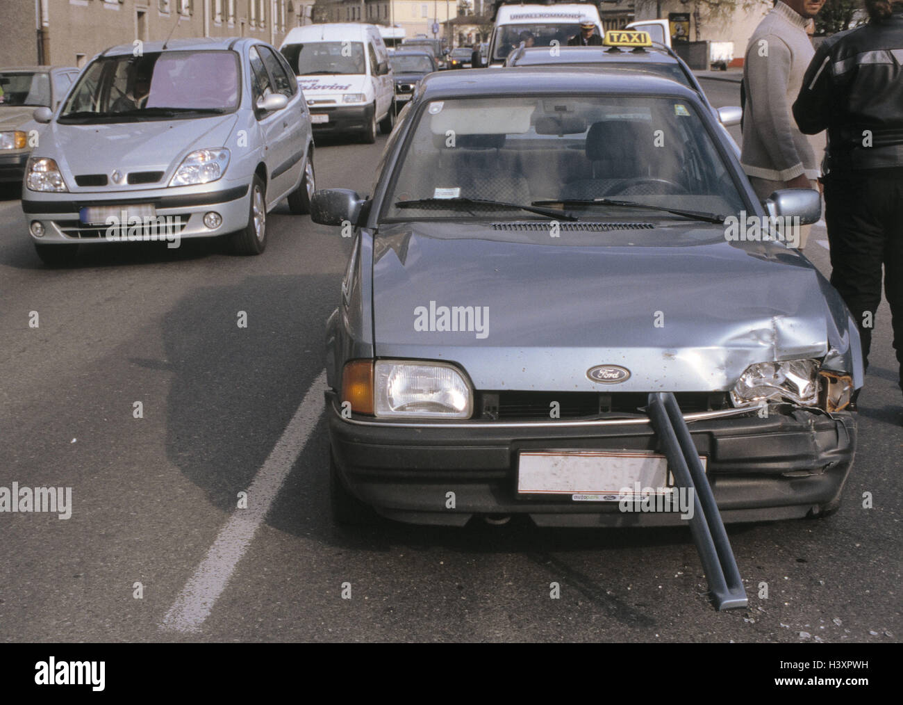 Town, traffic, car accident, damage to the bodywork, involved marks