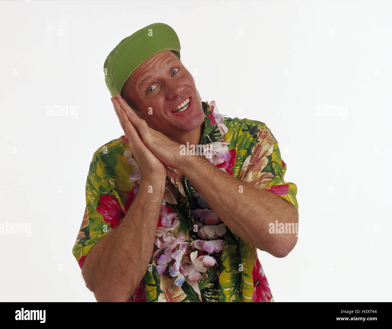 Tourist, Hawaii shirt, cap, gesture, tiredly, sleep, portrait, Holiday, vacation, studio, cut out, man, vacationer, flower catena, Lei, fatigue, overnight stay, place to sleep, sleep, accomodation, near, Stock Photo
