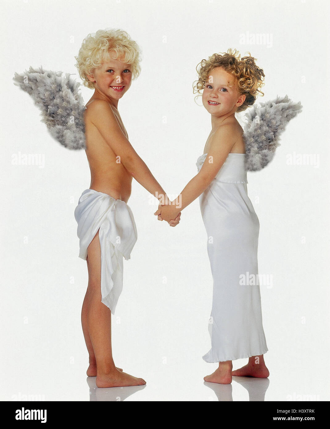 Boy, girl, angel, hand in hand, happy, x-mas, Christmas, children, two, curls, lining, wing, angel's wing, studio, cut out, X MAS folder, Stock Photo
