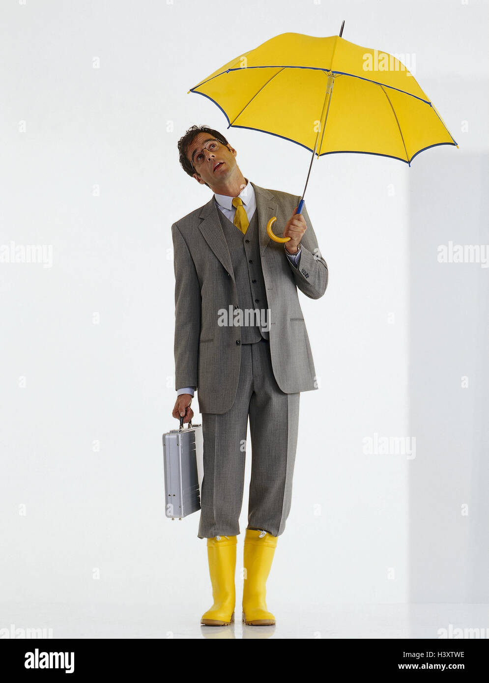 Businessman, young, briefcases, umbrella, wellington, view, up, checking, professions, studio