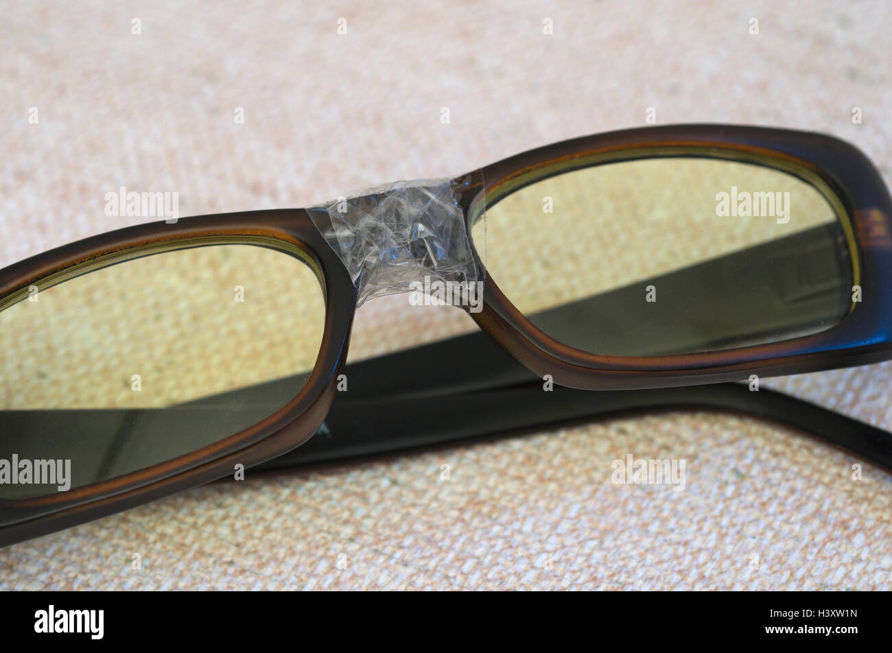 glasses mended with sticky tape Stock Photo Alamy